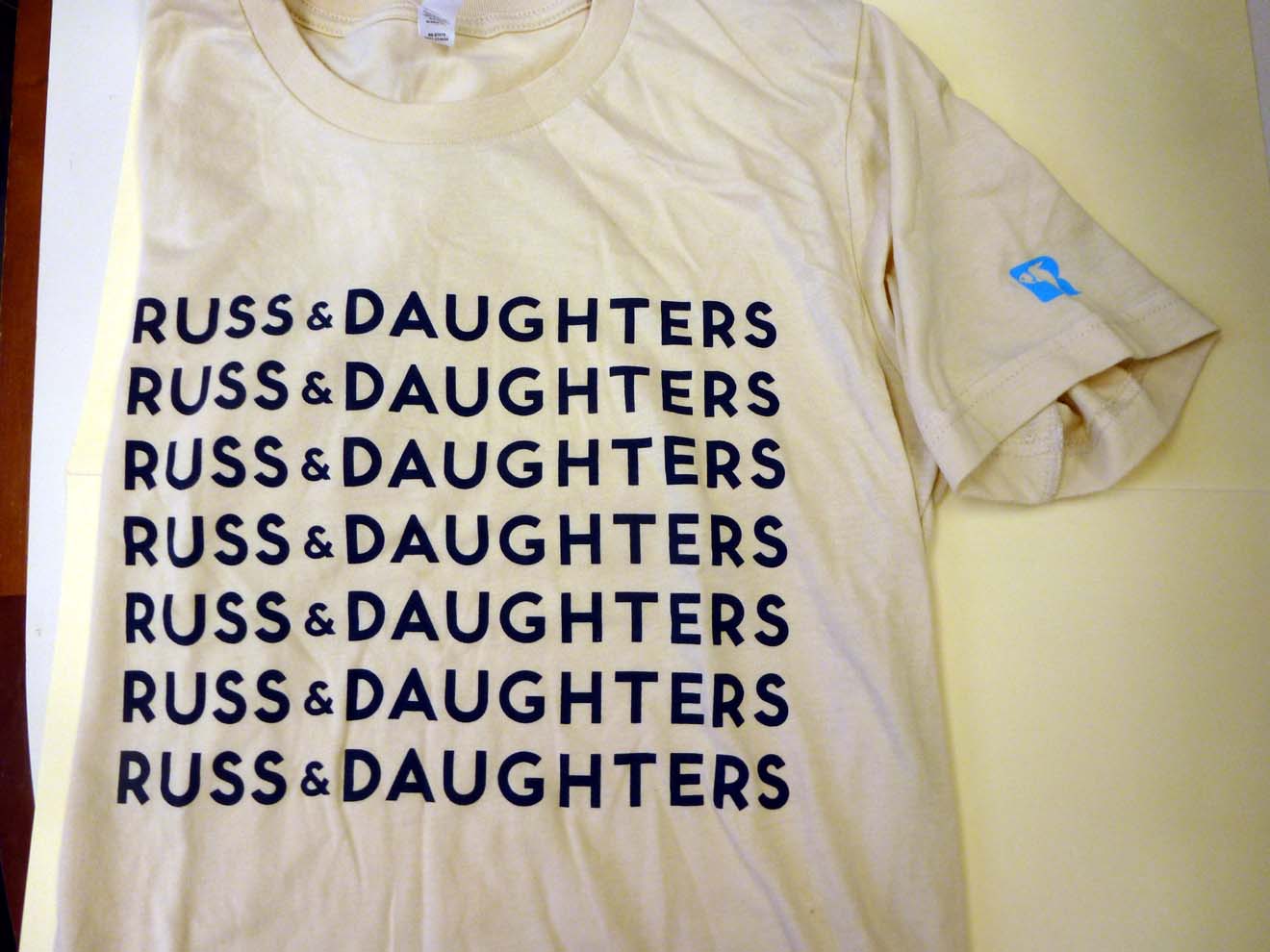 Russ & Daughters Beige Shirt with Blue Arm Logo